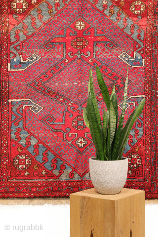 A wonderfully thick and plush antique Bergama rug, with a beautiful range of colours and an unmistakable village character. A deep indigo blue runs throughout the composition, brought to life by the  ...