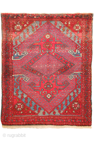 A wonderfully thick and plush antique Bergama rug, with a beautiful range of colours and an unmistakable village character. A deep indigo blue runs throughout the composition, brought to life by the  ...