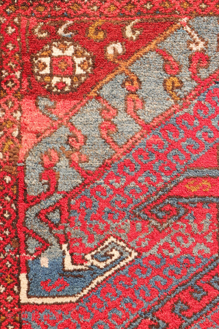 A wonderfully thick and plush antique Bergama rug, with a beautiful range of colours and an unmistakable village character. A deep indigo blue runs throughout the composition, brought to life by the  ...