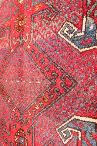 A wonderfully thick and plush antique Bergama rug, with a beautiful range of colours and an unmistakable village character. A deep indigo blue runs throughout the composition, brought to life by the  ...
