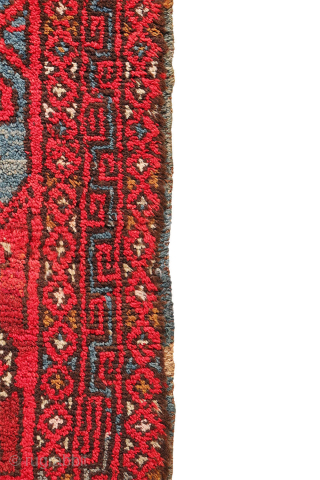 A wonderfully thick and plush antique Bergama rug, with a beautiful range of colours and an unmistakable village character. A deep indigo blue runs throughout the composition, brought to life by the  ...