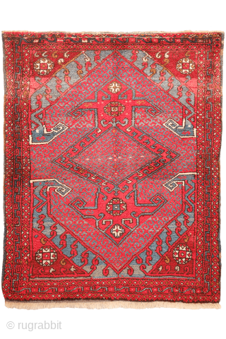 A wonderfully thick and plush antique Bergama rug, with a beautiful range of colours and an unmistakable village character. A deep indigo blue runs throughout the composition, brought to life by the  ...