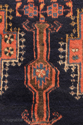
The deep indigo-blue field provides the perfect backdrop for the four medallions, woven in soft pastel colours that contrast beautifully with the dark ground. Although the medallions are drawn in a highly  ...