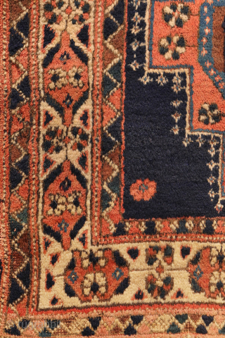 
The deep indigo-blue field provides the perfect backdrop for the four medallions, woven in soft pastel colours that contrast beautifully with the dark ground. Although the medallions are drawn in a highly  ...