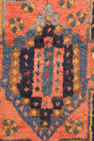 
The deep indigo-blue field provides the perfect backdrop for the four medallions, woven in soft pastel colours that contrast beautifully with the dark ground. Although the medallions are drawn in a highly  ...