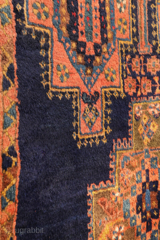 
The deep indigo-blue field provides the perfect backdrop for the four medallions, woven in soft pastel colours that contrast beautifully with the dark ground. Although the medallions are drawn in a highly  ...