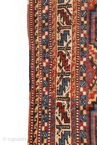 An antique Khamseh rug featuring three large medallions arranged horizontally, extending almost to the rug’s borders. The deep navy-blue field is richly decorated with birds, botehs, S-shaped motifs, and delicate vegetal elements.

The  ...