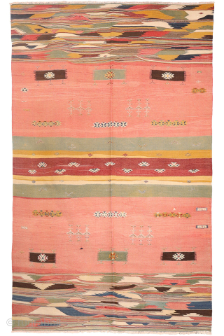 This antique Balikesir kilim features a rare and distinctive design, reminiscent of some early 1800s Balikesir Yuncu kilims. The central field is adorned with enigmatic motifs, seemingly depicting small, intricate rugs. The  ...