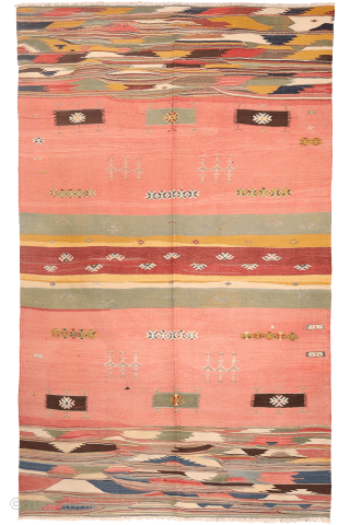This antique Balikesir kilim features a rare and distinctive design, reminiscent of some early 1800s Balikesir Yuncu kilims. The central field is adorned with enigmatic motifs, seemingly depicting small, intricate rugs. The  ...