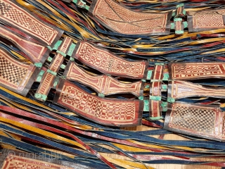 Tuareg leather womans travel bag ("aghrig"), with hand worked and dyed leather, probably goat skin. Intricate leather work with check pattern cut into dyed skin. The green dyed leather colour is considered  ...