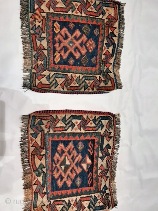 Pair of piled Luri saddle bag or "khorjin" faces, in very good condition, natural colours: green, light and dark indigo blue, yellow, undyed white and brown, terracotta, primitive design, new overbinding to  ...