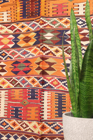 This  Qashqai kilim features a horizontal layout made up of bands of varying widths. Within these bands, the weaver incorporated a variety of traditional motifs — most notably the “comb” motif,  ...
