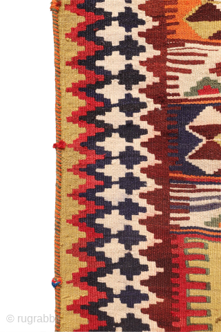 This  Qashqai kilim features a horizontal layout made up of bands of varying widths. Within these bands, the weaver incorporated a variety of traditional motifs — most notably the “comb” motif,  ...