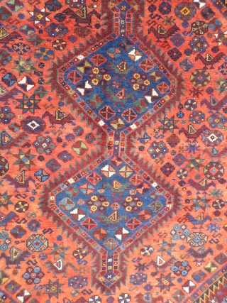 Superb Persian Arabic rug. Great range of colours including terracota, emerald green, pistachio green and yellow. Soft shinny wool, very good condition including colourful side cords. 202x155 cms.     