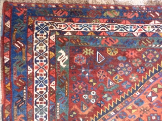 Superb Persian Arabic rug. Great range of colours including terracota, emerald green, pistachio green and yellow. Soft shinny wool, very good condition including colourful side cords. 202x155 cms.     