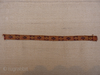 A Huari Culture band, 8th to 12th century, Huari Culture , South Central Perú. Wool. From a Spanish private collection. 39x2,8 cms. (T1511011)          