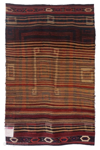 The design of this shaggy antique Uzbek sleeping rug (Julkhyr) is stunning, very rough, bold and archaic, featuring a huge central motif in the form of concentric squares.

The border, in a way,  ...