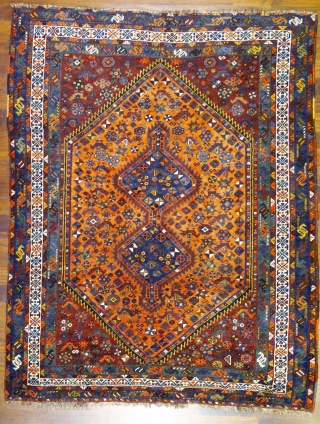 A rug woven by Arab groups in the south of Iran. All the dyes are natural and the dyer has achieved a fantastic range of colours including mustard, terracotta and emerald green.  ...