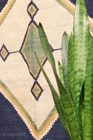 Antique minimalist Qashqai Kilim with Striking Blue
This remarkable 1920s Qashqai kilim is distinguished by the predominance of dark blue, achieved entirely with natural dyes. The weaver created a simple yet visually striking ...