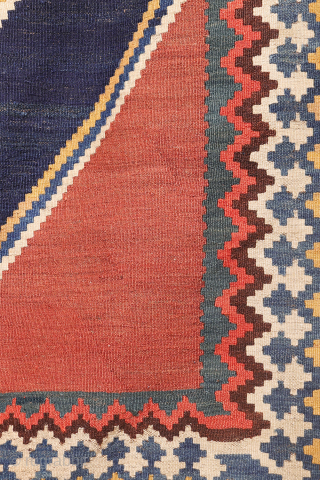 Antique minimalist Qashqai Kilim with Striking Blue
This remarkable 1920s Qashqai kilim is distinguished by the predominance of dark blue, achieved entirely with natural dyes. The weaver created a simple yet visually striking ...