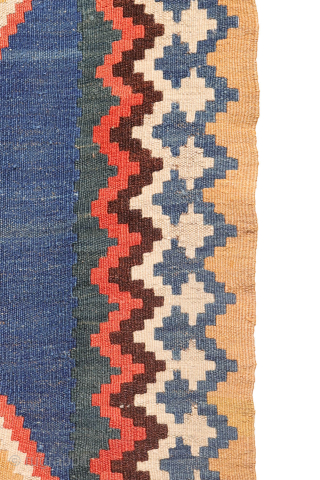 Antique minimalist Qashqai Kilim with Striking Blue
This remarkable 1920s Qashqai kilim is distinguished by the predominance of dark blue, achieved entirely with natural dyes. The weaver created a simple yet visually striking ...