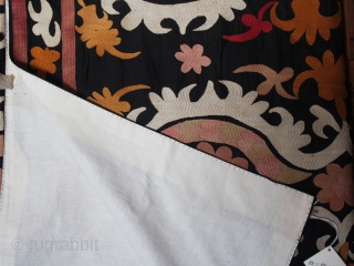 Suzani cod. 0052. Cotton embroidery on cotton. Uzbekistan. Fisrt half 20th. century. Size cm. 200 x 230 (79" x 91"). Very good condition. Backed with a white cotton textile.    