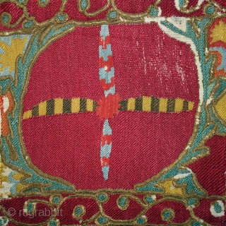 Suzani fragments cod. 0494. Silk embroidery on cotton, traditional dyes. Central Asia. Mid. 19th. century. Very good condition. Cm. 65 x 150 (2'2" x 4'11"). Professionally sewn onto a cotton black ground  ...