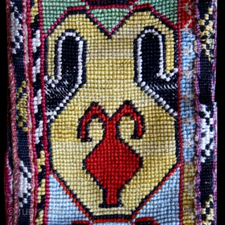 Cross stitch embroidered belt or robe trim cod. 0668. Silk, cotton, traditional dyes backed with ikat. Central Asia.19th. century. Cm. 108 x 9 (3’6” x 4”). Very good condition.
Robe trim made in  ...