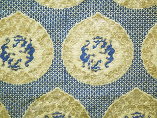 Kinran Kesa fragment cod. 0856. Gold foil, paper. Japan.  19th Century. Size cm. 23 x 25 (9” x 10”). Very good condition. Mounted on a wooden frame.
This exquisite textile fragment showcases  ...