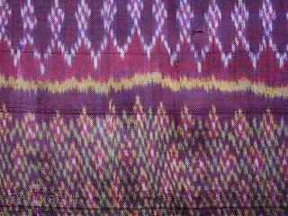 Ikat Sampot (Sarong)cod. 0680. Silk, natural dyes with brilliant colors. Cambodia. Circa early 20th. century. Extremely finely woven. Handstitched to form a tube. Dimension cm 180 x 90 (71" x 35")
The bold ...