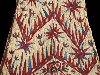 Woman’s yellow Chyrpy fragment cod. 0679. Silk embroidery on silk. Turkmen people. Central Asia. Early 19th. century. Cm. 42 x 81 (16.5 x 32 inches).  
Sewn onto black canvas and mounted  ...