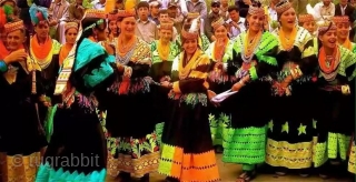 Kalash valley woman costume/clothes  including  haeaddress,  belt and necklaces 
                    