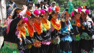 Kalash valley woman costume/clothes  including  haeaddress,  belt and necklaces 
                    