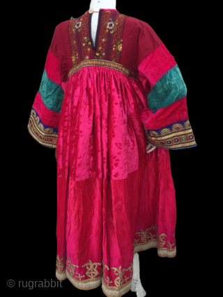 Tribal antique Pashtun nomadic silk hand embroidered high quality golden threaded red velvet dress from Afghanistan.
                 