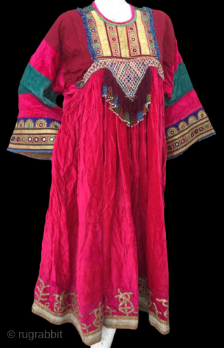Tribal antique Pashtun nomadic silk hand embroidered high quality golden threaded red velvet dress from Afghanistan.
                 