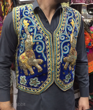 Vintage mid 20th century vest , very finely handcrafted , decorated with metal sequins                   
