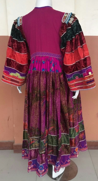 Tribal Kuchi vintage hand embroidered woman dress from Afghanistan.
Very finely decorated dress in its best condition.
The dress has Beautiful long skirt.
            