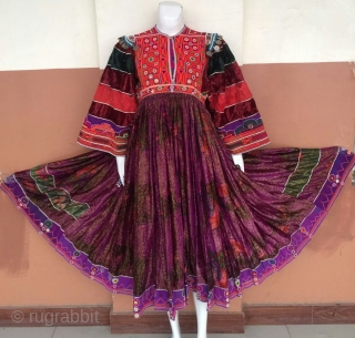 Tribal Kuchi vintage hand embroidered woman dress from Afghanistan.
Very finely decorated dress in its best condition.
The dress has Beautiful long skirt.
            
