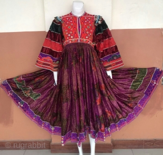 Tribal Kuchi vintage hand embroidered woman dress from Afghanistan.
Very finely decorated dress in its best condition.
The dress has Beautiful long skirt.
            