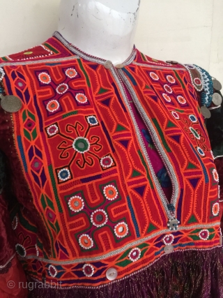 Tribal Kuchi vintage hand embroidered woman dress from Afghanistan.
Very finely decorated dress in its best condition.
The dress has Beautiful long skirt.
            