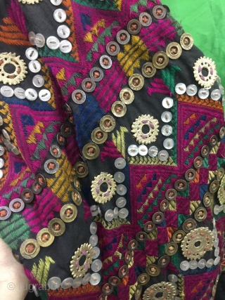 Tribal "Jumlo" wedding dress from Indus Kohistan valley of Pakistan.
The dress is completely hand embroidered with pure silk threads.
The dress is in its best condition.Very finely decorated with old pendants , mother  ...