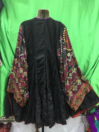 Tribal "Jumlo" wedding dress from Indus Kohistan valley of Pakistan.
The dress is completely hand embroidered with pure silk threads.
The dress is in its best condition.Very finely decorated with old pendants , mother  ...