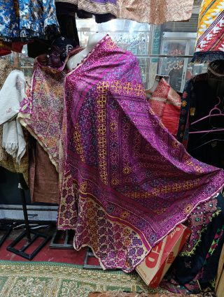 Swat valley shawl.Very fine hand embroidery done in silk threads. Vintage from swat , Pakistan . In excellent condition. Size 85× 48 inches. Please contact @ 
nooristanartgallery@yahoo.com      