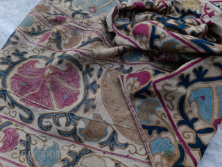Antique Suzani textile from the 18th century.
A fragment or nearly complete textile. Silk embroidery.
A rare and high quality.
Size 67 × 29 inches 
For details please contact @ nooristanartgallery@yahoo.com     