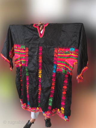 Tribal Pashtun rare dera ismail Khan region woman dress
In excellent condition. Silk threads hand embroidered on black silk fabric , The dress is extra large size 
Circa mid 20th c   