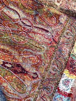 
a very beautiful old Kashmir long shawl with a Black center which is not very easy to find,with a few small holes which is very normal in these type of vintage shawls.Colour  ...