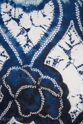 This is a wonderful Japanese children's yukata, or cotton kimono, with a bold
shibori dyed pattern of undulating lines and flowers. This dyed
pattern was created using multiple techniques, including ori-nui
(folded and stitched) and  ...