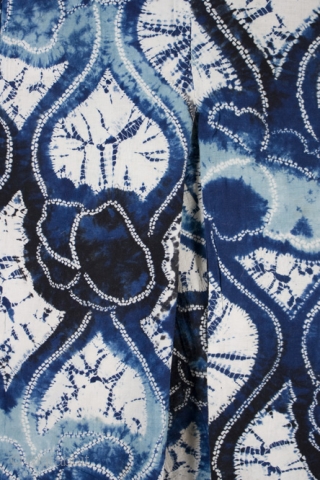 This is a wonderful Japanese children's yukata, or cotton kimono, with a bold
shibori dyed pattern of undulating lines and flowers. This dyed
pattern was created using multiple techniques, including ori-nui
(folded and stitched) and  ...