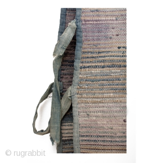 A well-worn cotton sodenashi, or work vest. It's weft is woven using shreds of fabric salvaged from other garments or cloth, with a cotton warp. Colors shift gracefully from faded neutrals to  ...