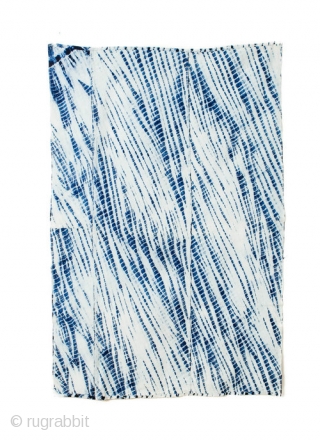 A wonderful piece of antique Japanese yanagi shibori, willow patterned tie dye on hand loomed cotton made with botanical indigo dye. 

The graceful pattern was created by hand pleating the cotton and  ...